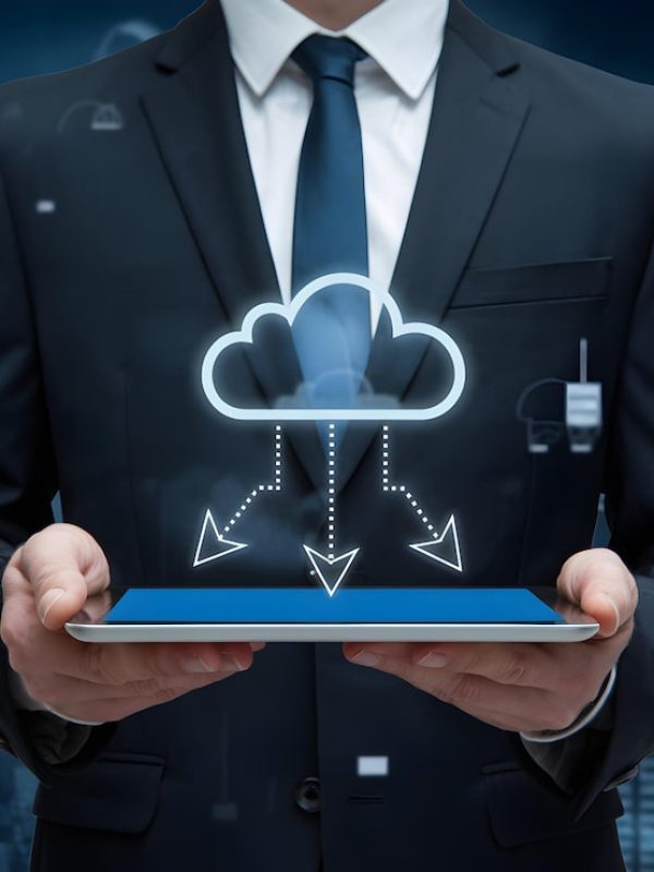 suit-clad-man-holds-tablet-showing-cloud-computing-technology-social-media_904318-23684